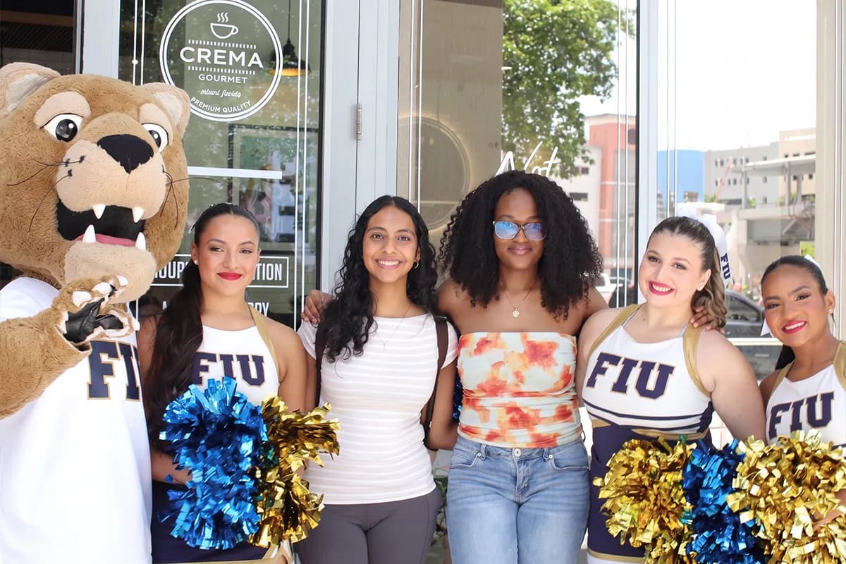 The FIU Panther and the FIU cheer squad outside Crema Gourmet at FIU